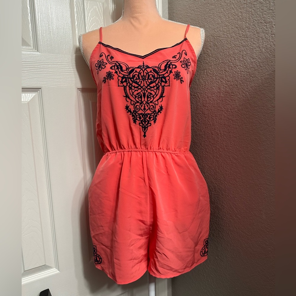 Coral Romper with navy embroidered print